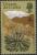 Colnect-1967-021-Bog-fern-and-snow-capped-mountain.jpg