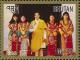 Colnect-4044-751-King-Jigme-Khesar-Namgyel-Wangchuck-and-women.jpg