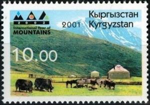 Colnect-2797-408-Mountain-Pasture-Yaks-Bos-mutus-Yurt.jpg