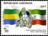 Colnect-5146-858-Flags-of-Gabon-and-Equatorial-Guinea-and-mascot-Holding-bal.jpg