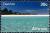 Colnect-4504-160-Turquoise-sea-and-atoll-with-sandy-beach.jpg