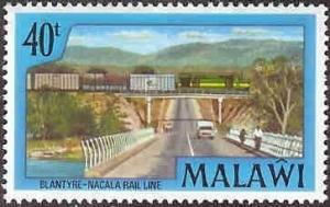 Colnect-1733-728-Freight-train-of-Blantyre-Nacala-line-on-overpass.jpg
