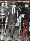 Colnect-3269-167-Kennedy-on-crutches-from-war-injuries.jpg