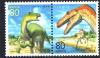 Colnect-5228-318-Iguanodon-and-Dromaeosaurus.jpg