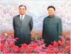 Colnect-3199-598-Kim-Il-Sung-and-Kim-Jong-Il-in-the-flowerbed.jpg
