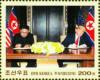 Colnect-5902-636-President-Trump-and-Kim-Jong-un-Signing-Delcaration.jpg