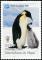 Colnect-5217-123-Adult-penguin-feeding-a-chick.jpg