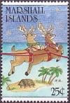 Colnect-3100-572-Reindeer-hut-and-palm-trees.jpg