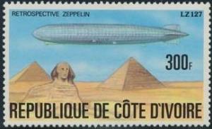 Colnect-1738-536-LZ127-over-Sphinx--amp--pyramids.jpg