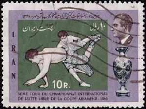 Colnect-3470-920-Freestyle-wrestlers-Ariamehr-cup.jpg