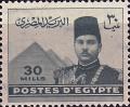 Colnect-1279-802-King-Farouk-in-front-of-the-Pyramids-of-Gizeh.jpg