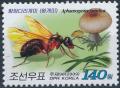 Colnect-3316-712-Ant-Aphaenogaster-famelica---Mushroom.jpg