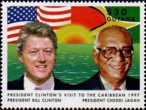 Colnect-4768-720-Clinton-and-Jagan-with-Guyana-and-USA-Flags.jpg
