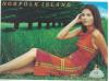 Colnect-5447-389-Woman-sitting-on-grass-with-perfume-bottle-booklet.jpg