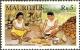 Colnect-2149-324-Deshelling-of-Coconuts.jpg