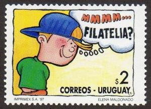 Colnect-1461-709-Boy-thinking-in-Philately.jpg