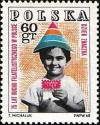 Colnect-4628-125-Child-holding-symbolic-stamp.jpg