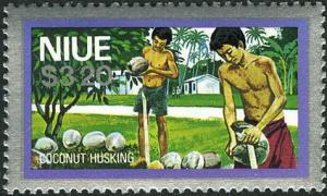 Colnect-3326-969-Husking-coconuts.jpg