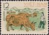 Colnect-6312-480-Herdgirl-with-Cattle-Bos-indicus-taurus.jpg