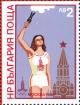 Colnect-5487-158-Girl-with-Olympic-Fire-Spasskaya-Tower-Moscow.jpg