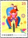 Colnect-2694-678-Family-riding-bicycle.jpg