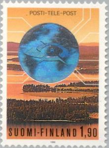 Colnect-160-039-Landscape-with-P-auml-ij-auml-nne-Lake-world-map-postal-badge.jpg