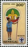 Colnect-2133-698-World-Scout-Emblem-and-Scout-Holding-Flag-Pole.jpg