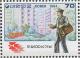 Colnect-2764-722-Mailman-in-city.jpg