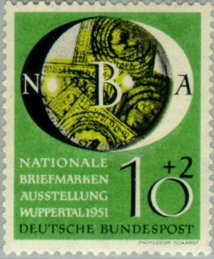 Colnect-152-113-Old-German-stamps-under-a-magnifying-glass.jpg