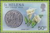 Colnect-4137-287-Ten-pence-coin-and-arum-lily.jpg