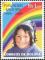 Colnect-1410-309-Smiling-Child-and-Rainbow.jpg