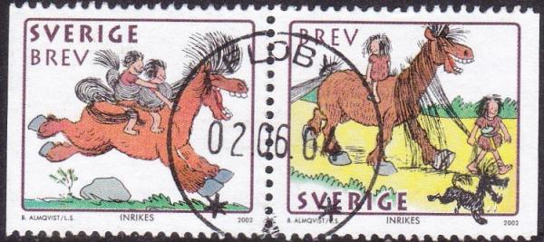 Colnect-5115-504-Children-riding-horse-Child-leading-horse.jpg