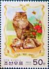 Colnect-2045-471-Mother-Cat-and-Kittens-Felis-silvestris-catus-in-Basket.jpg