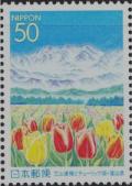 Colnect-3935-284-Tateyama-Mountain-Range-and-Tulip-field.jpg