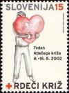 Colnect-699-066-Man-carrying-heart.jpg