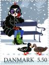 Colnect-760-314-Woman-on-parkbenchduckpair.jpg