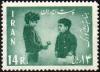 Colnect-1732-388-Boy-presents-some-flowers-to-the-Crown-Prince-Cyrus-Reza.jpg