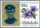 Colnect-3150-618-Capt-Mark-Phillips-and-blue-hibiscus.jpg