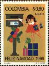 Colnect-3812-801-Child-posting-Christmas-card.jpg