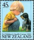 Colnect-2131-616-Boy-with-Puppy-Canis-lupus-familiaris.jpg