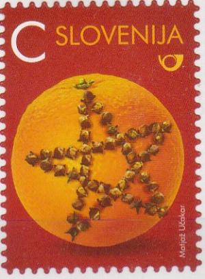 Colnect-3639-511-Orange-with-Cloves.jpg
