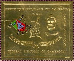 Colnect-2770-992-Coat-of-Arms-and-President-Ahidjo.jpg