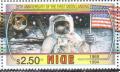 Colnect-4702-094-Astronaut-holding-flag.jpg