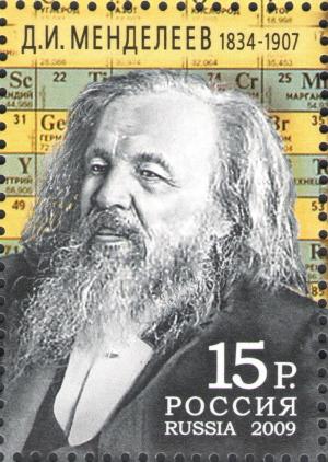 Colnect-2359-184-Photo-on-the-background-of-Mendeleev-periodic-table.jpg