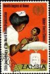 Colnect-2913-302-Nurse-Weighing-Baby.jpg