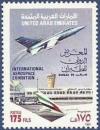 Colnect-2133-988-Jet-fighter-over-Dubai-Intl-Airport.jpg
