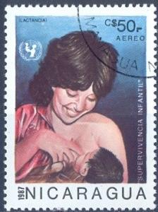 Colnect-2374-452-Mother-breastfeeds-a-child.jpg