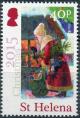 Colnect-4718-506-Santa-with-Christmas-tree-and-sack-of-presents.jpg