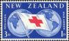 Colnect-3558-242-Red-Cross-flag-in-front-of-globe.jpg
