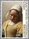 Colnect-5947-177-Vermeer-s--The-Milkmaid--detail.jpg